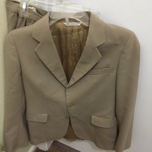 Beige business suit.